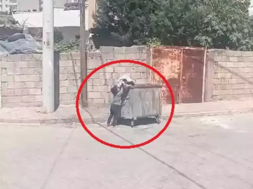 Yere atılan eski kilimi alıp çöp konteynerine bırakan kız çocuğuna belediyeden ödül