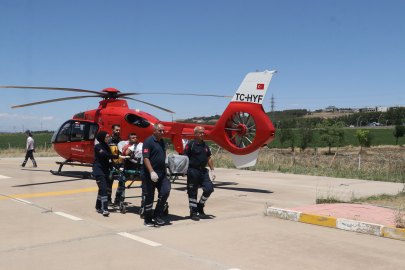 Çim biçme makinesine kolunu kaptırdı, ambulans helikopterle sevk edildi